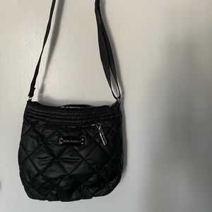 Vera Bradley Black quilted puff cross body bag.
